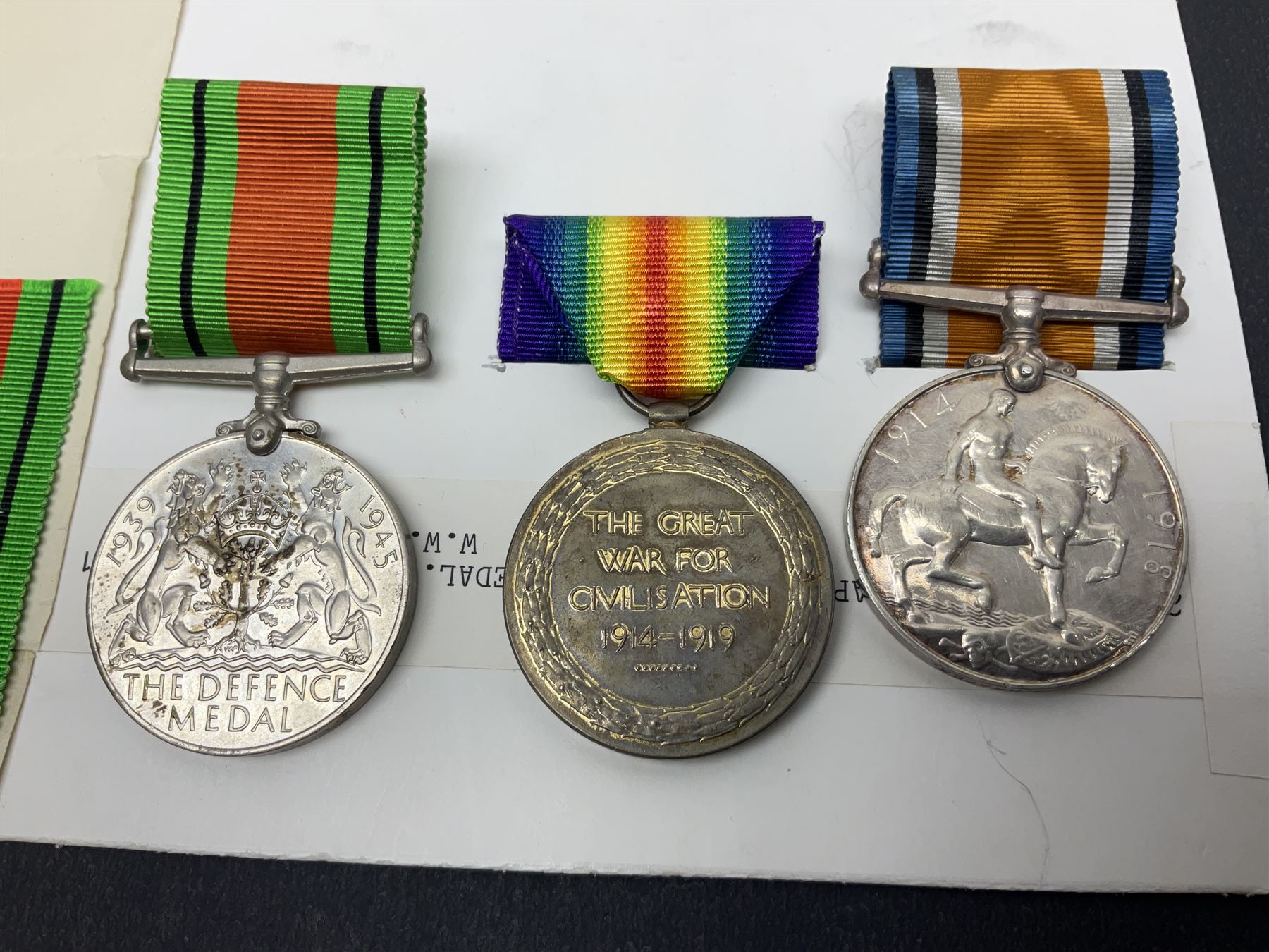 WWI pair of medals comprising British War Medal and Victory Medal awarded to 2nd Lieutenant C.T. Draper; and WWII Defence Medal awarded to Captain C.T. Draper with War Office letter of confirmation; all with ribbons (3)