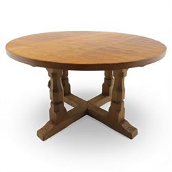 Mouseman - oak coffee table, the circular adzd top over four pillars united by stretchers, with signature mouse carving by Robert Thompson of Kilburn 