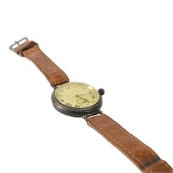 Silver cased trench watch enamel dial with Roman numerals, red XII, Longines movement, used in the Boer war, inscribed to the back 'E M Everitt From W.E Everitt 1882' 