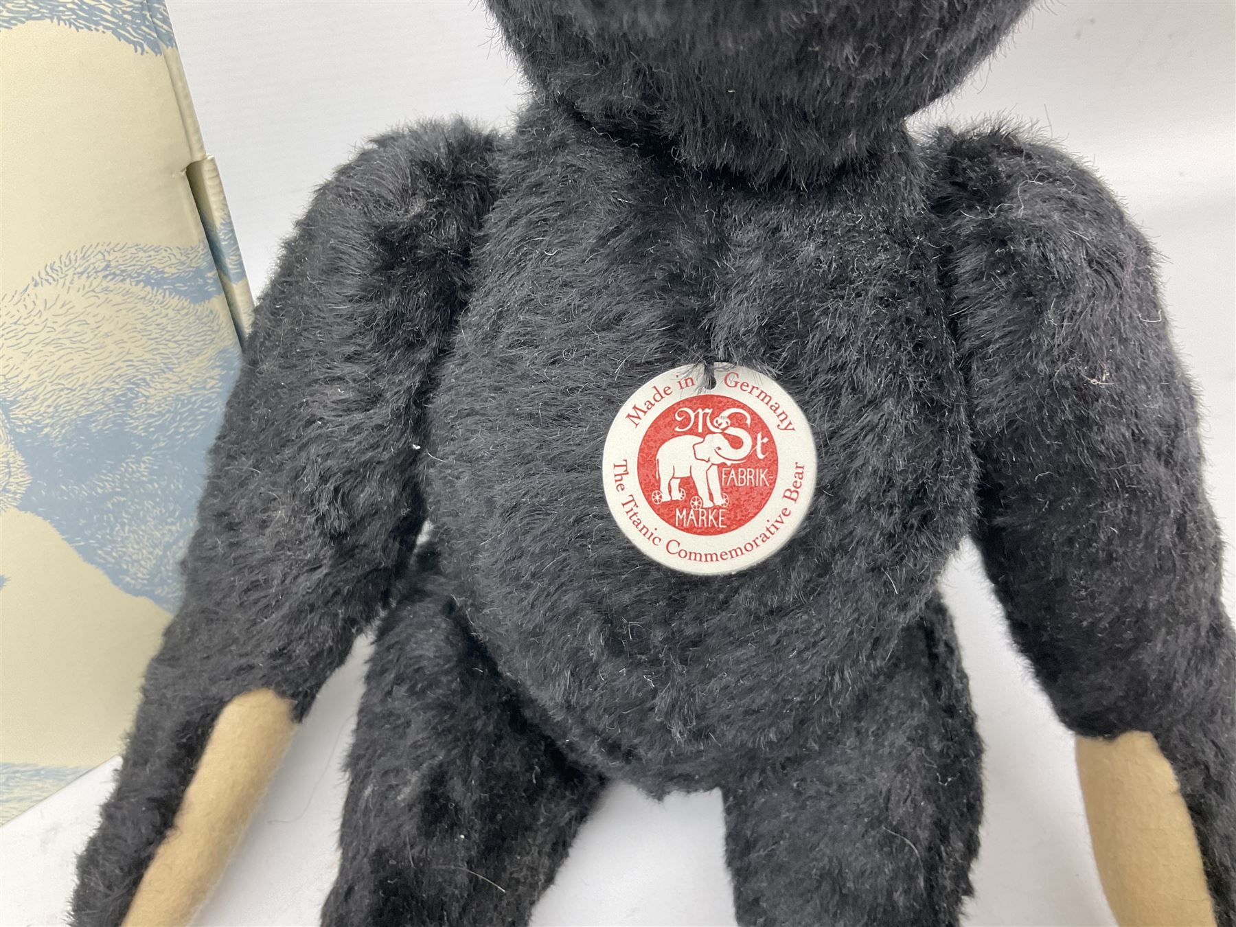 Steiff 'Leo the 1912 Titanic Mourning Bear', in black mohair with tag, limited edition no. 605, with original certificate and box