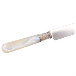 Late 19th/early 20th century American silver Shell & Thread type pattern part canteen, comprising twelve table spoons, twelve table forks, twelve dessert forks, twelve mother of pearl handled butter knives, eleven smaller mother of pearl handled butter knives, eleven teaspoons, twelve pastry forks, six parfait spoons, and large soup ladle, marked for Mermod, Jaccard & Co., St Lois, Missouri, also marked Sterling