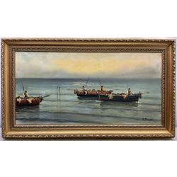 Italian School (20th century): Fishing Boats in Gentle Seas, oil on canvas indistinctly signed 39cm x 79cm