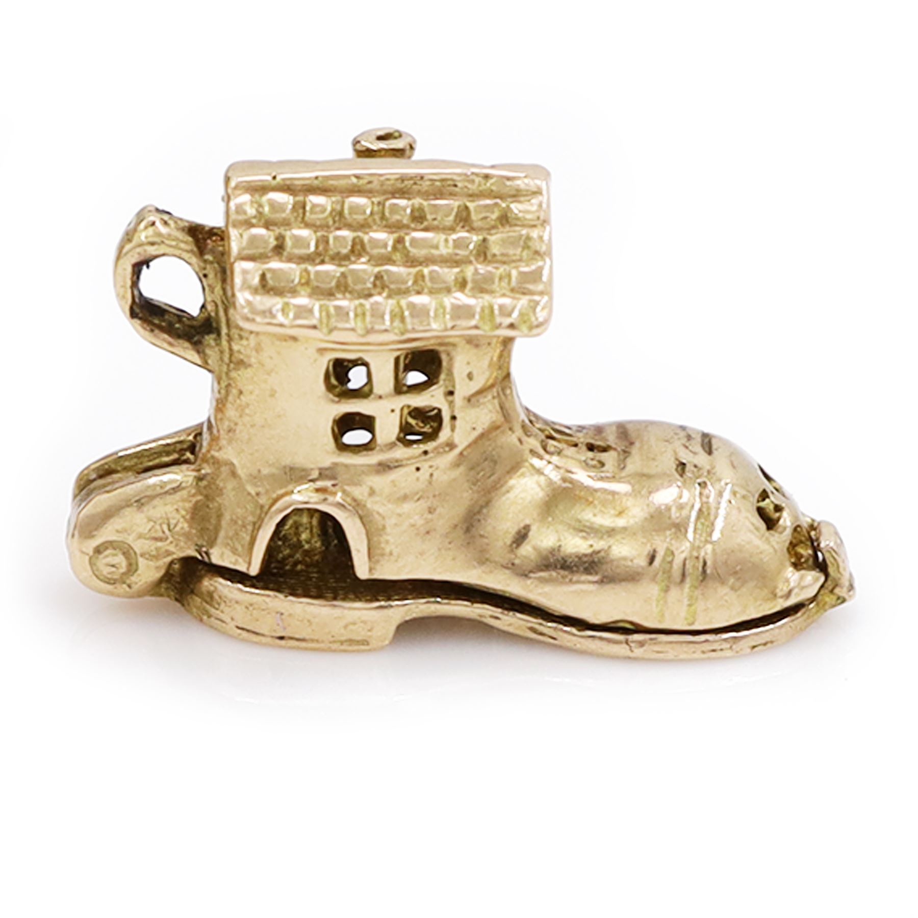 Two gold pendants / charms including 17ct guitar and a 9ct articulated lady in a shoe, London 1964