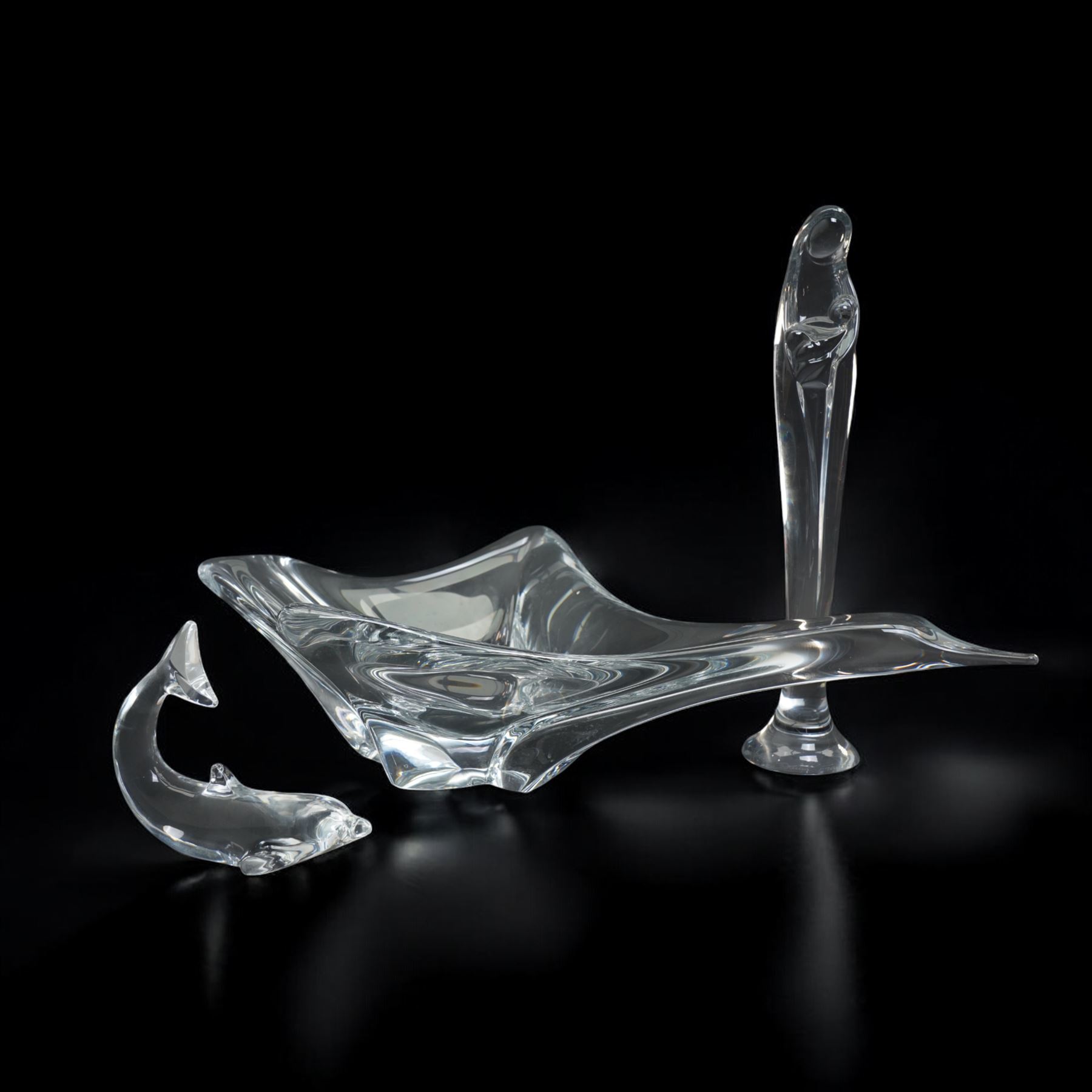Daum-20th century clear glass sculpture of Madonna and Child H29cm, Daum glass dish in the form of a bird in flight L47cm and a Baccarat model of a dolphin L13cm (3)