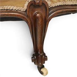 Victorian mahogany chaise lounge, scrolled back rest with deep buttoned back, upholstered in beige velvet, raised on a carved frame raised on cabriole supports terminating in castors 