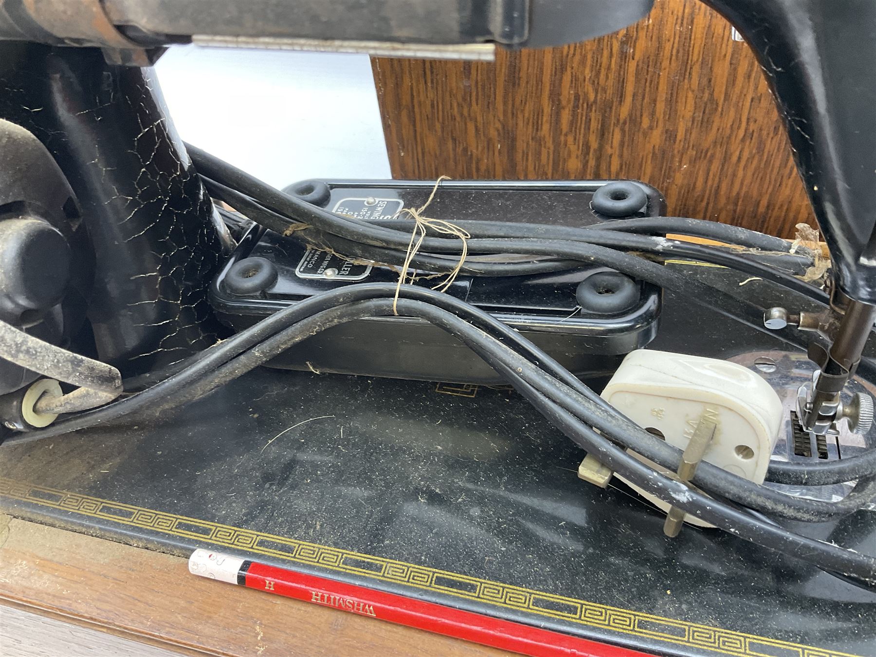 Mahogany cased electric Singer sewing machine, not tested 