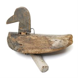 Antique naive wooden decoy duck with nodding head and balancing weight L26cm and a copper shot flask (2)