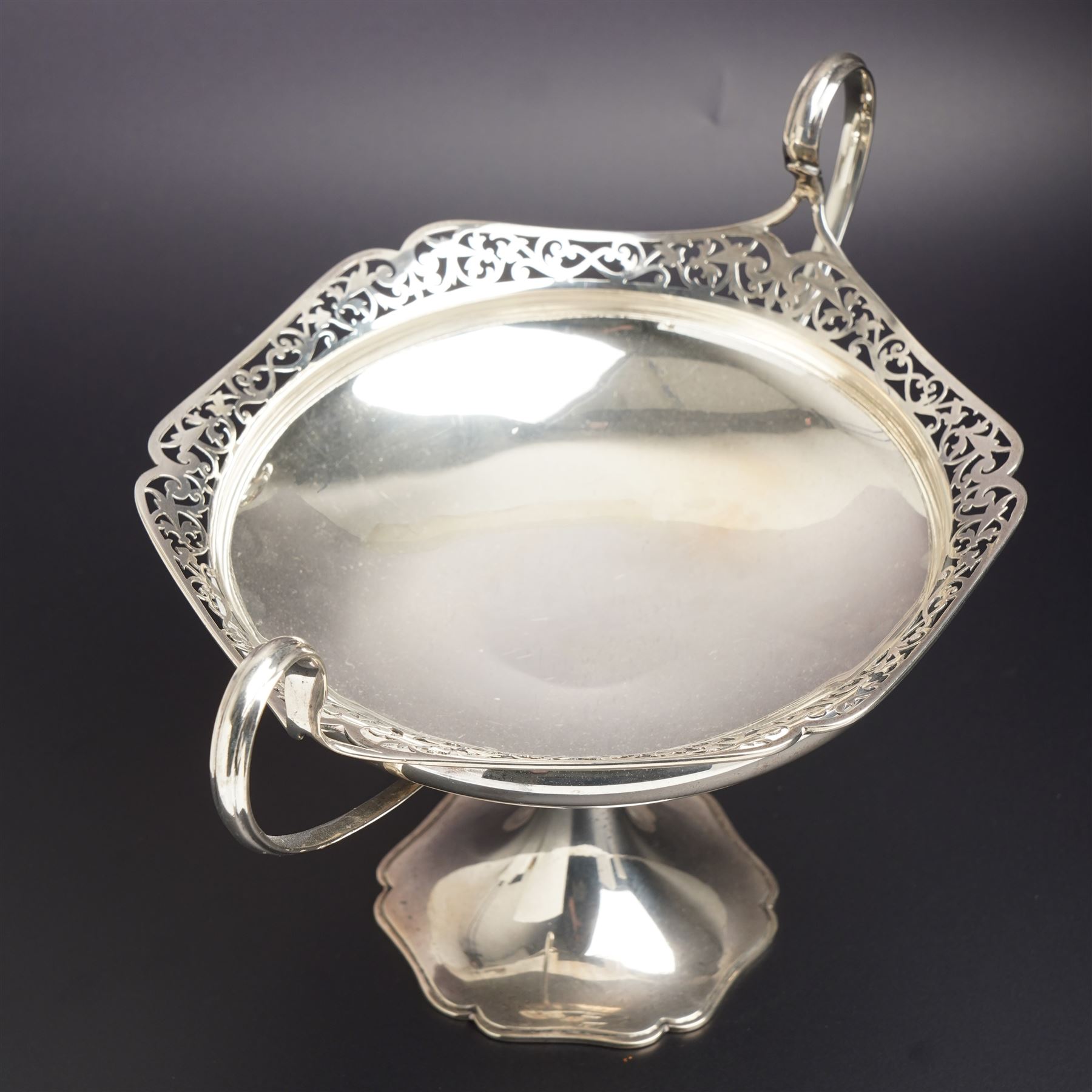 Silver two handled fruit dish with pierced border on a pedestal foot D18cm Birmingham 1912  