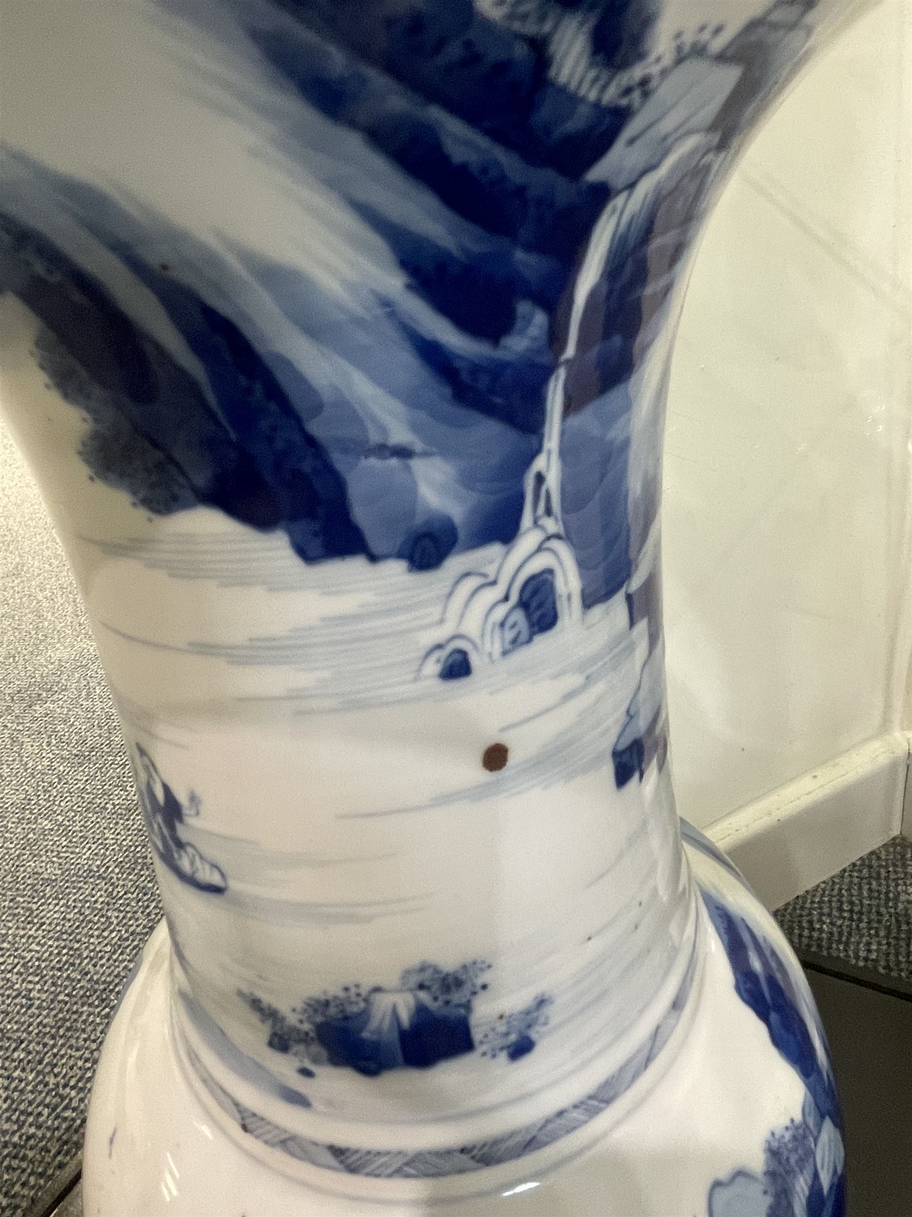 Qing Dynasty Yen Yen blue and white vase in the Kangxi style decorated with a lake landscape surrounded by rocky cliffs, figures in a boat and on the shore H45cm 