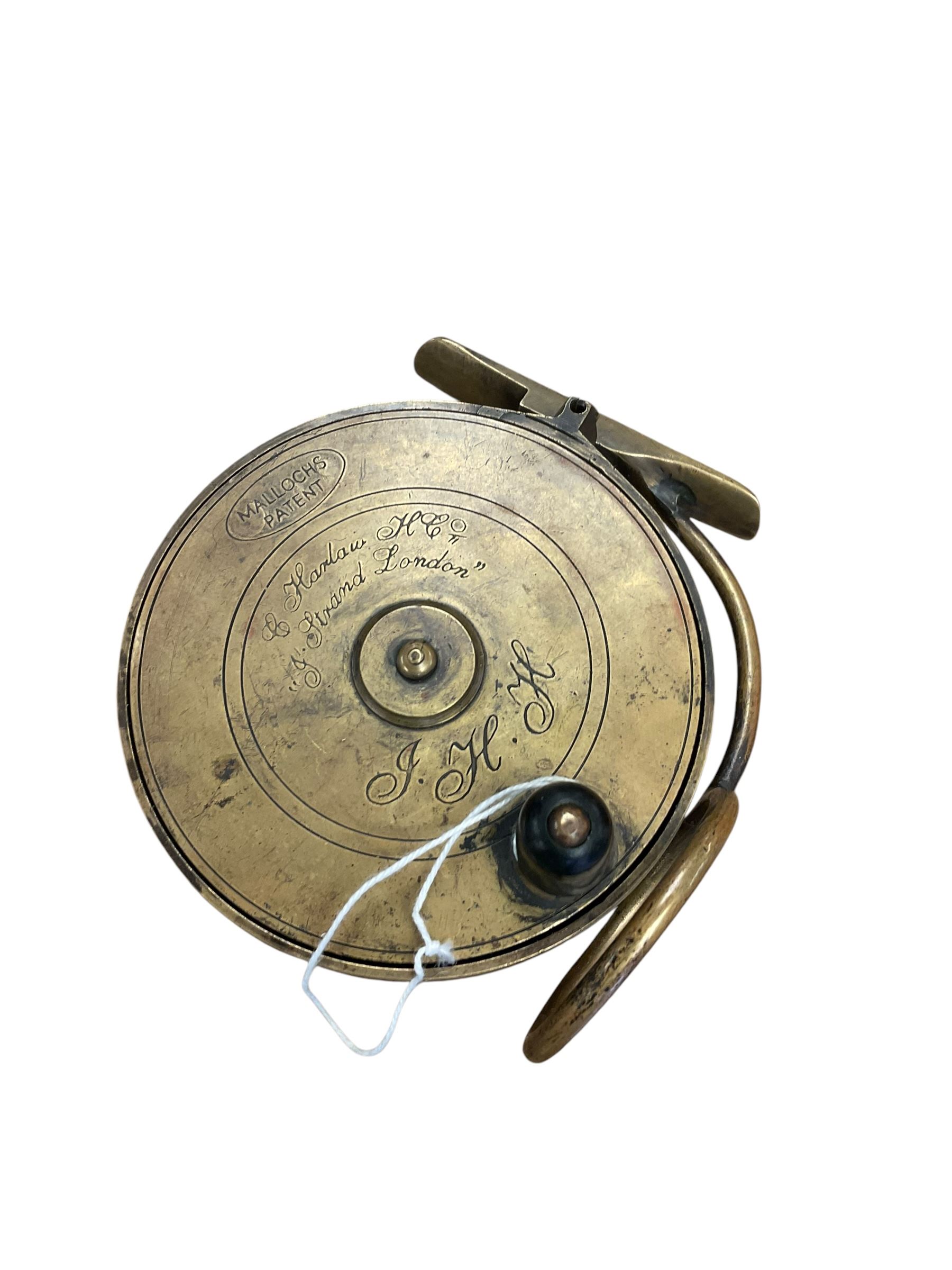 Three fishing reels, comprising Abu Ambassadeur 7000 multiplier, Hardy 'Altex' Fishing Reel and fishing reel measuring marked Mallochs patent & Strand London 
