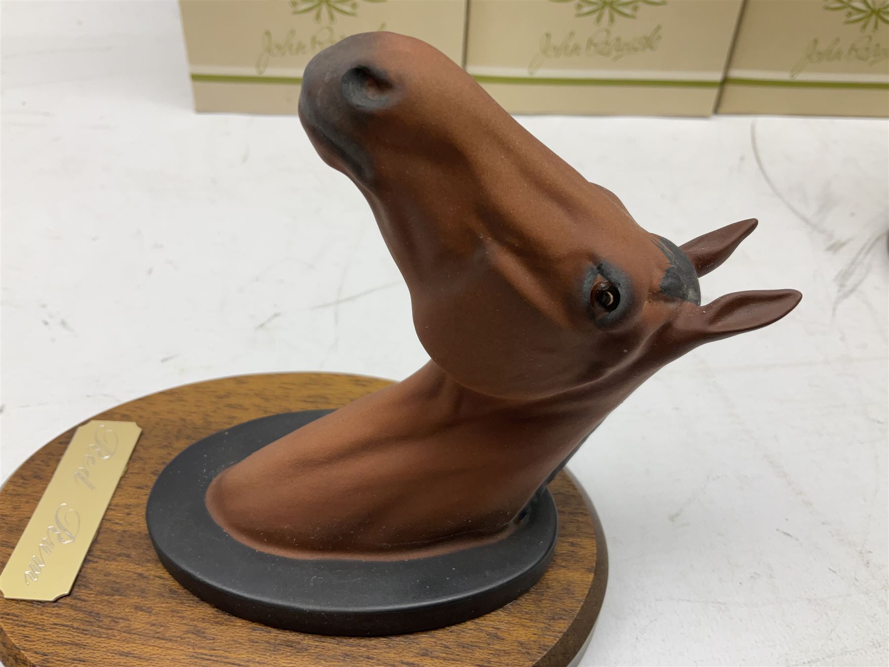 Beswick set of horse head wall plaques 'Champions all', comprising Arkle no.2700, The Minstrel no.2701, Red Rum no.2702, Troy no.2699, all with original boxes