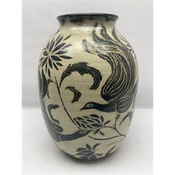 John Egerton (c1945-): studio pottery stoneware vase decorated with birds in flowers braches upon a white ground, H40cm