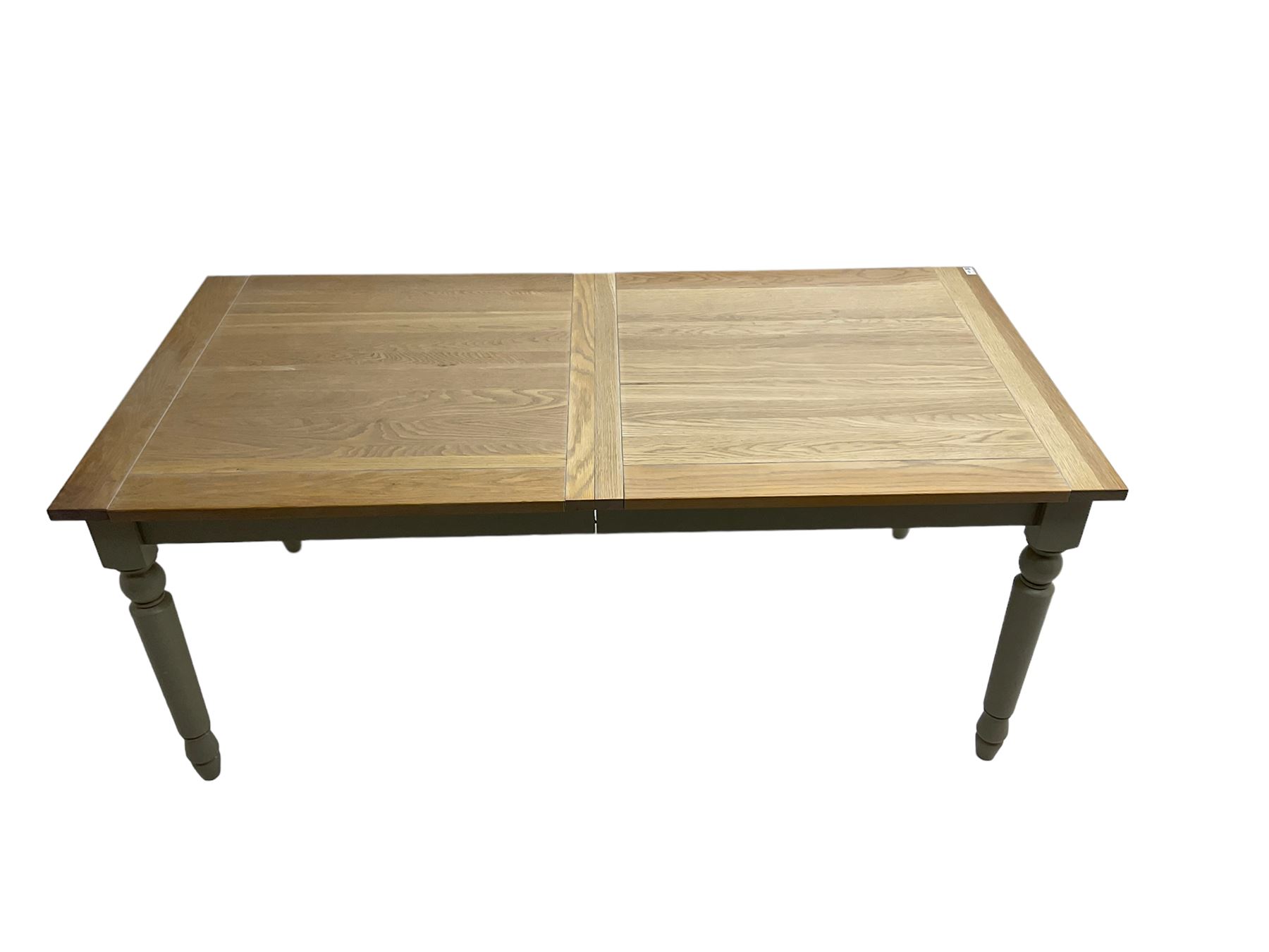 Neptune - 'Suffolk' 8-12 seat extending dining table, rectangular oak with breadboarded ends, on light grey finish base with turned supports, three additional leaves
