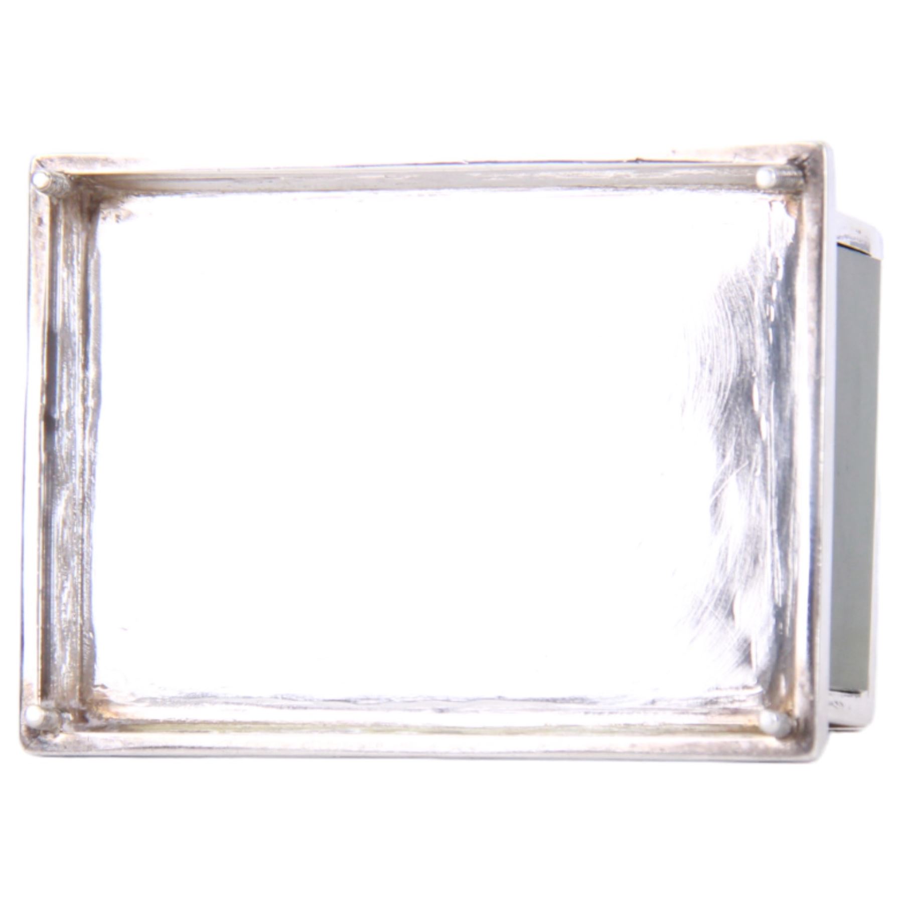 Edwardian silver and nephrite casket, of rectangular form with inset nephrite panels to sides, the removable cover surmounted with a nephrite recumbent lion, hallmarked Frank Hyams Ltd, London 1906, H9.5cm W9cm D6.5cm