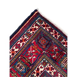 Persian Meimeh indigo ground rug, the central medallion within a field of small floral lozenge motifs, the guarded border with repeating pattern