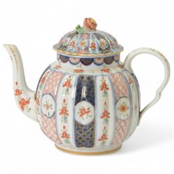 19th century continental teapot, decorated with panels of floral sprigs and latticework, t...