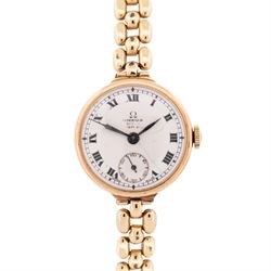 Omega early 20th century 9ct gold manual wind wristwatch, white enamel dial with subsidiar...