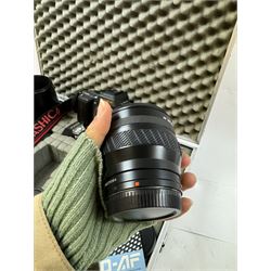 Yashica 230-AF camera outfit, including camera body serial no. 0184693, three Yashica lenses comprising AF 70-200mm 1:4.5 serial no. F6162003, AF 28-85mm 1:3.5-4.5 macro lens serial no. F6225564 and an AF 75-300mm 1:4-5.6 Macro lens serial no. F7100913, flash, hood and other accessories and instruction booklet, contained within a silver flight case 