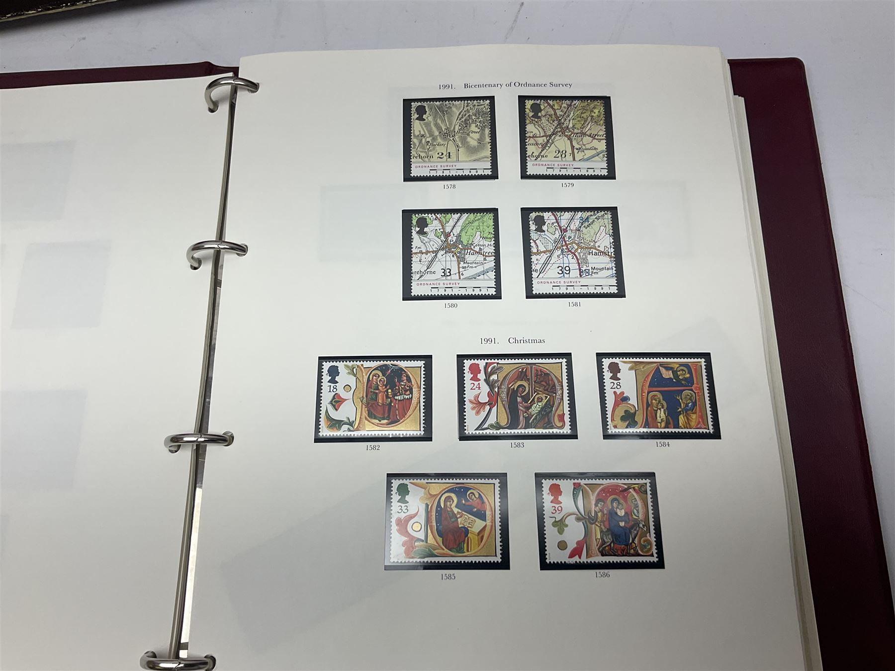 Great British stamps including Queen Elizabeth II mostly commemorative mint decimal issues with 1st class, miniature sheets etc, pre-decimal issues and other QEII stamps with mint and used, housed in four ring binder folders and loose