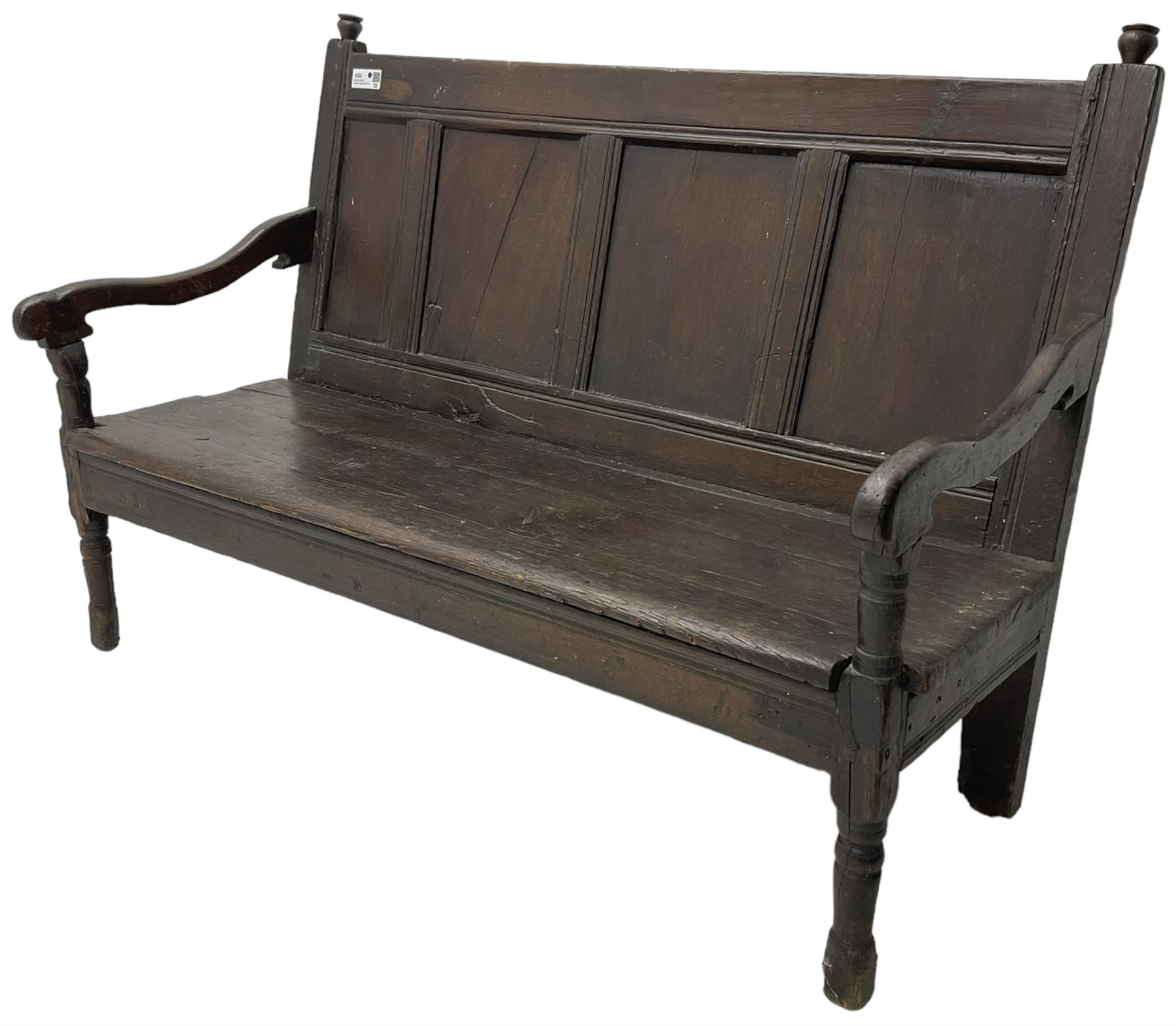 18th century oak hall bench or settle, quadruple panelled back with moulded rails, over a solid seat, raised on front turned supports