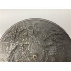 Late 19th century bronze plaque, of circular form, depicting the angel appearing to Adam and Eve in the garden of Eden in high relief, D25.5cm
