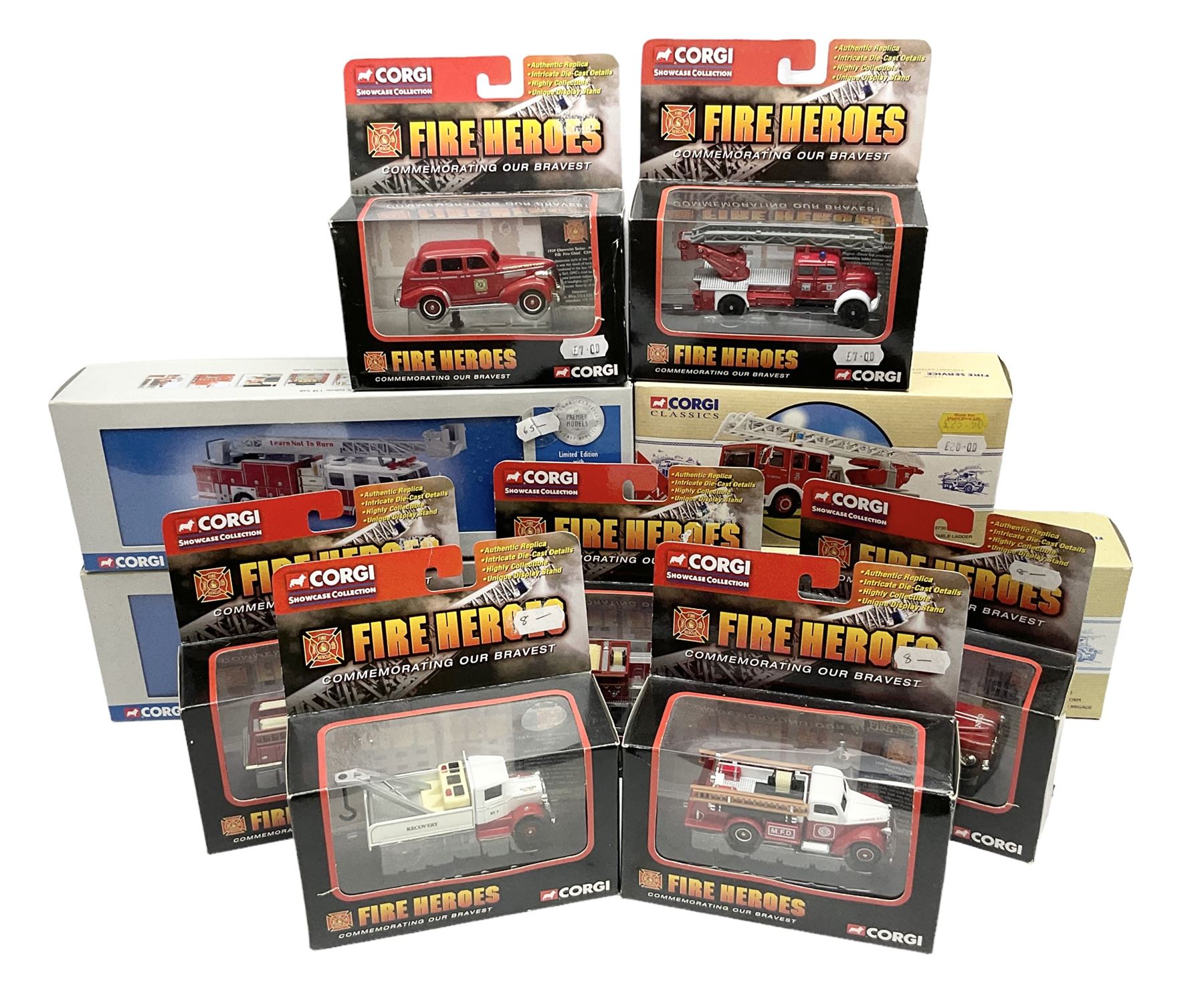 Corgi - eleven fire-fighting vehicles comprising limited edition 54706 E1 Side Mount Washington DC and 54902 E1 75ft Ladder Duncan Fire Department; 97392 Simon/Dennis Hydraulic Platform; 97361 AEC Turntable Ladder;  and seven 'Fire Heroes'; all boxed (11)