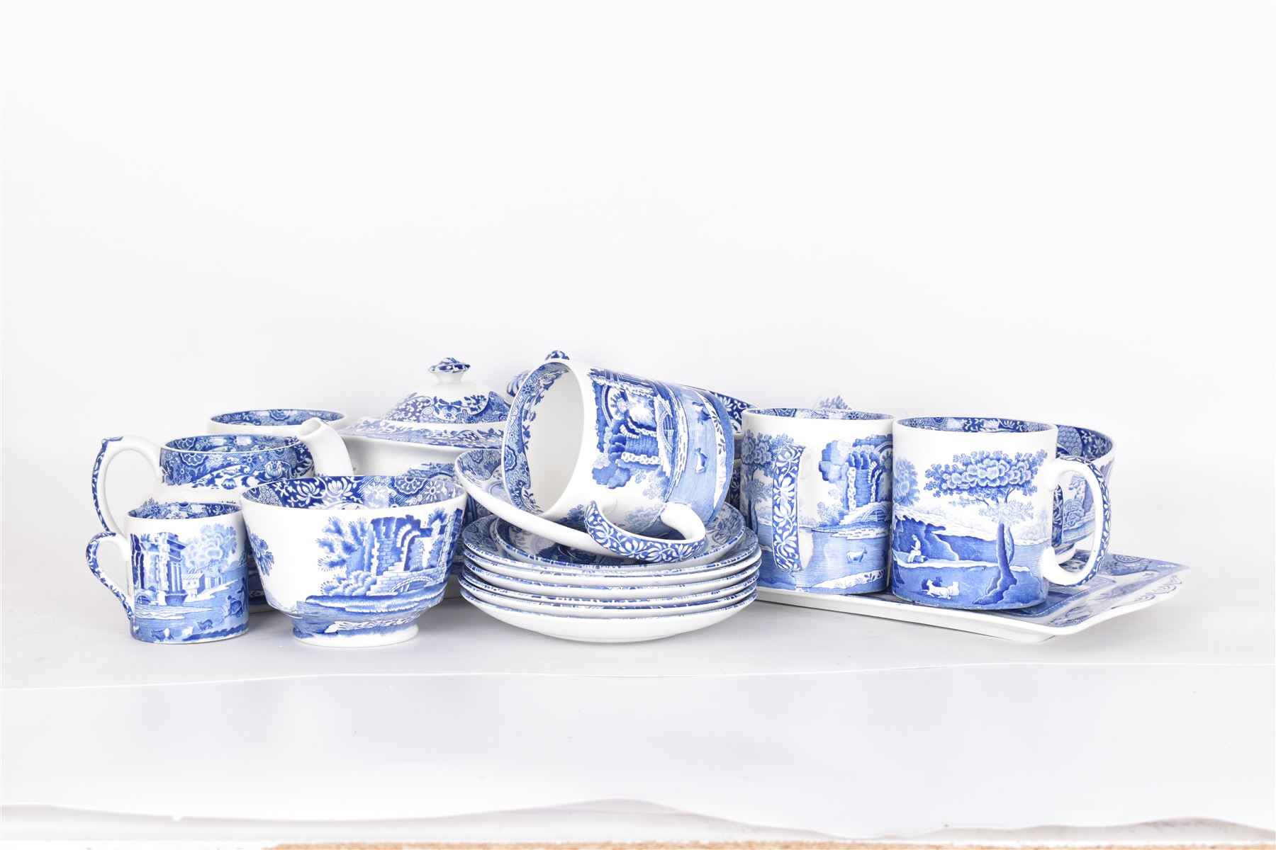 Spode Italian pattern tea service, comprising teapot, milk jug, open sucrier, six cups and saucers, two coffee cans and saucers, six dessert plates, four mugs and a sandwich plate (30) 