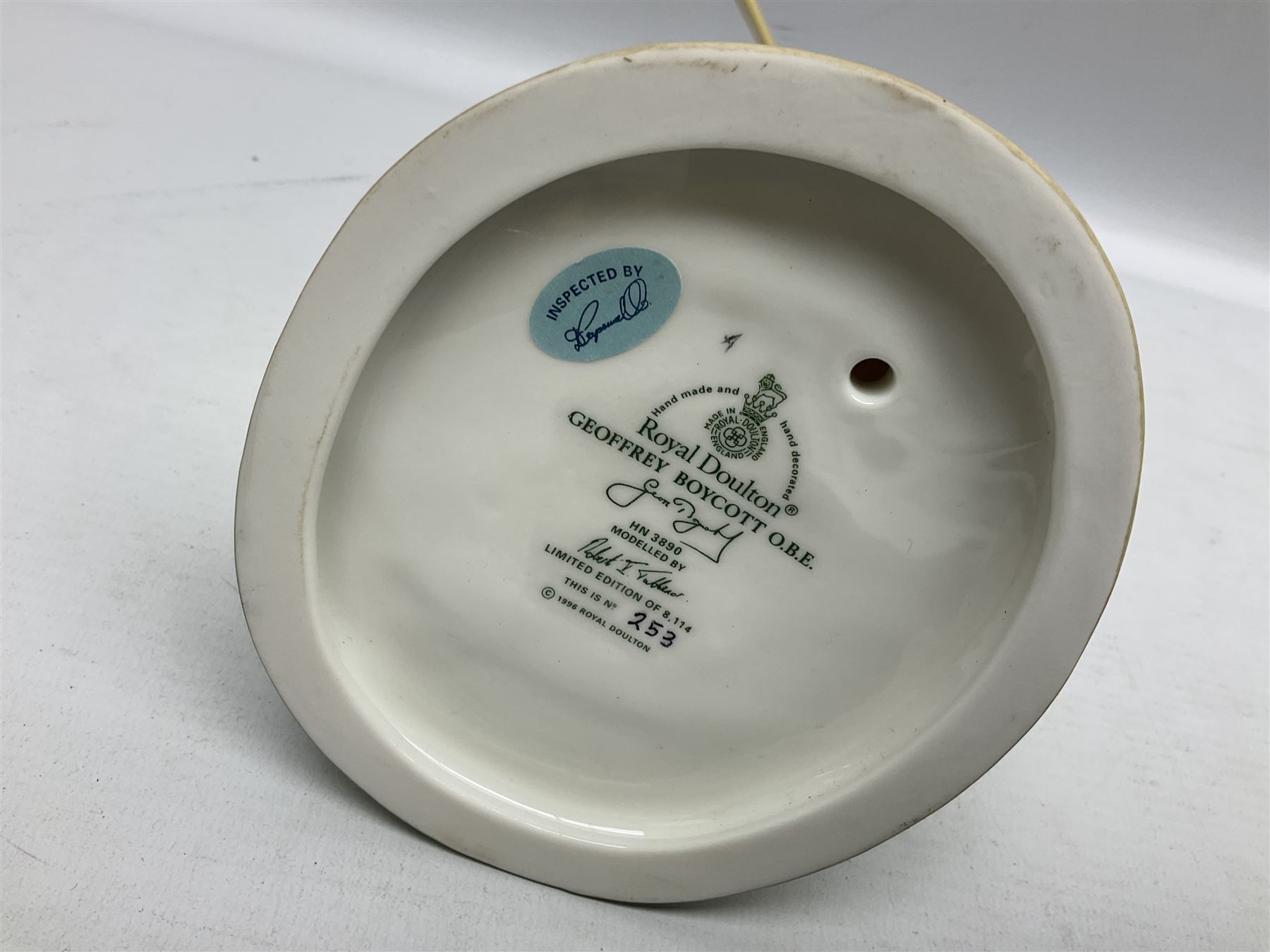 Royal Doulton limited edition figure of Geoffrey Boycott O.B.E, HN3890, no 253/8114, together with four Royal Doulton limited edition character jugs of cricket interest, comprising The Hampshire Cricketer D 6739, no 3903/5000, Freddie Trueman O.B.E, D 7090, no 502/9500, Brian Johnners Johnston, D 7018, no 1281/9500 and Len Hutton D 6945 no 263/9500, four with certificates, one with box