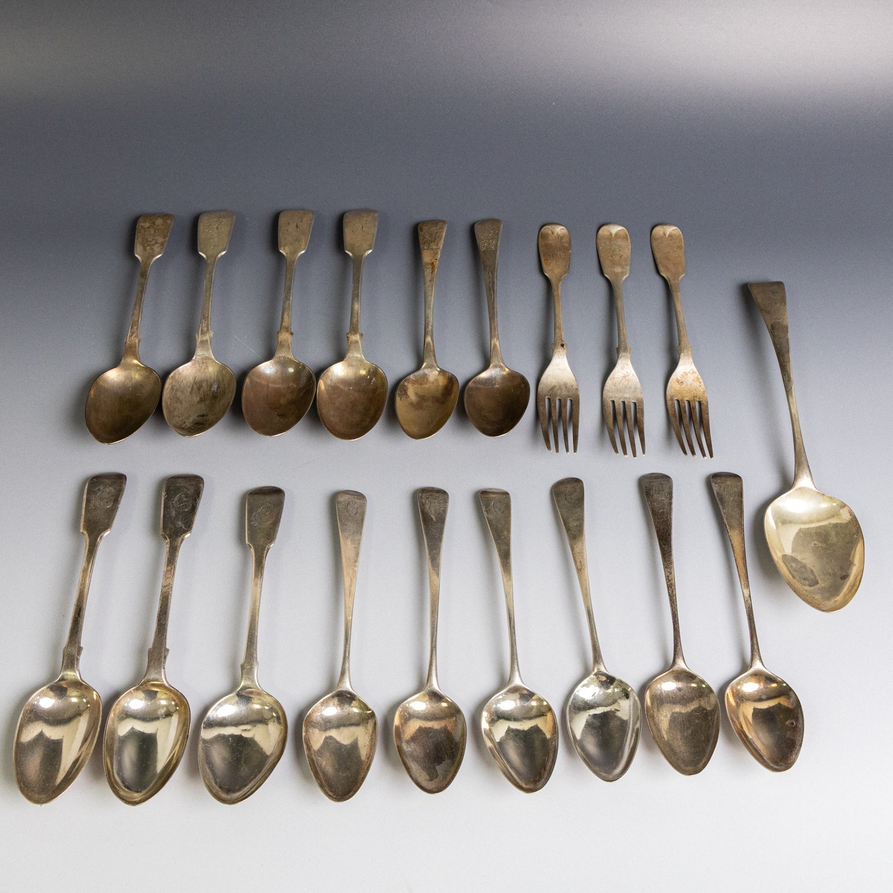 Collection of silver flatware, comprising set of six Georgian teaspoons, three Victorian Exeter silver dessert forks, Georgian Old English pattern table spoon, etc all hallmarked