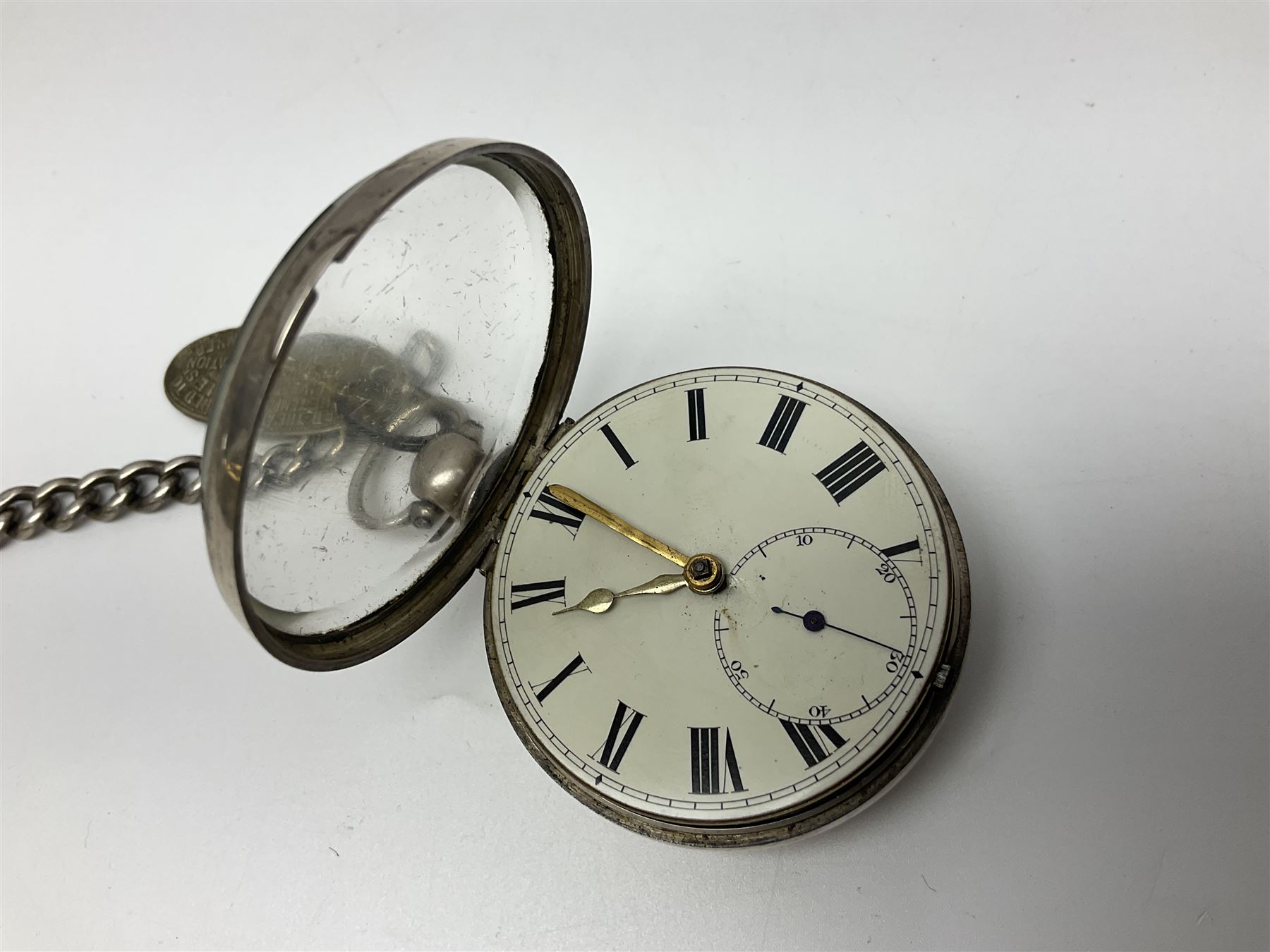 Victorian silver pair cased fusee lever pocket watch, No. 6765, cream enamel dial with Roman numerals, case makers mark R.S, Birmingham 1861, on silver Albert chain
