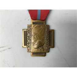 Five continental medals - WW1 Belgian Cross of Fire; WW1 French Croix De Guerre; French Croix De Combattant; French Republic Workers silver merit awarded to L. Mounet 1950; and boxed French Palmes Universitaires Officier d'Academie silver and enamel wreath (5)