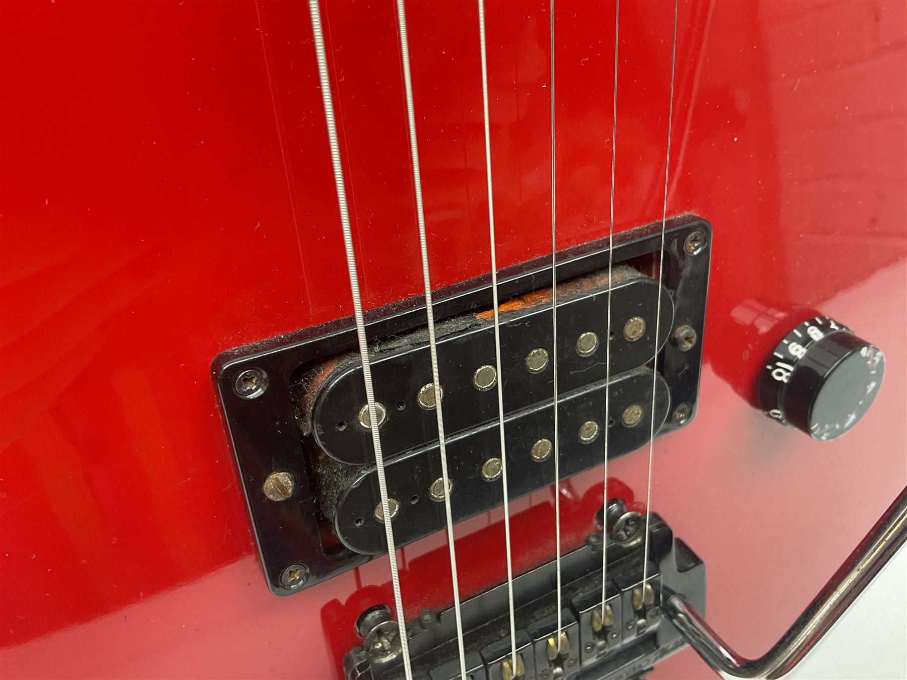 American Peavey Nitro 1 hand-made electric guitar in red with Kahler tremolo, serial no.02786479, L98cm overall; in soft carrying case.