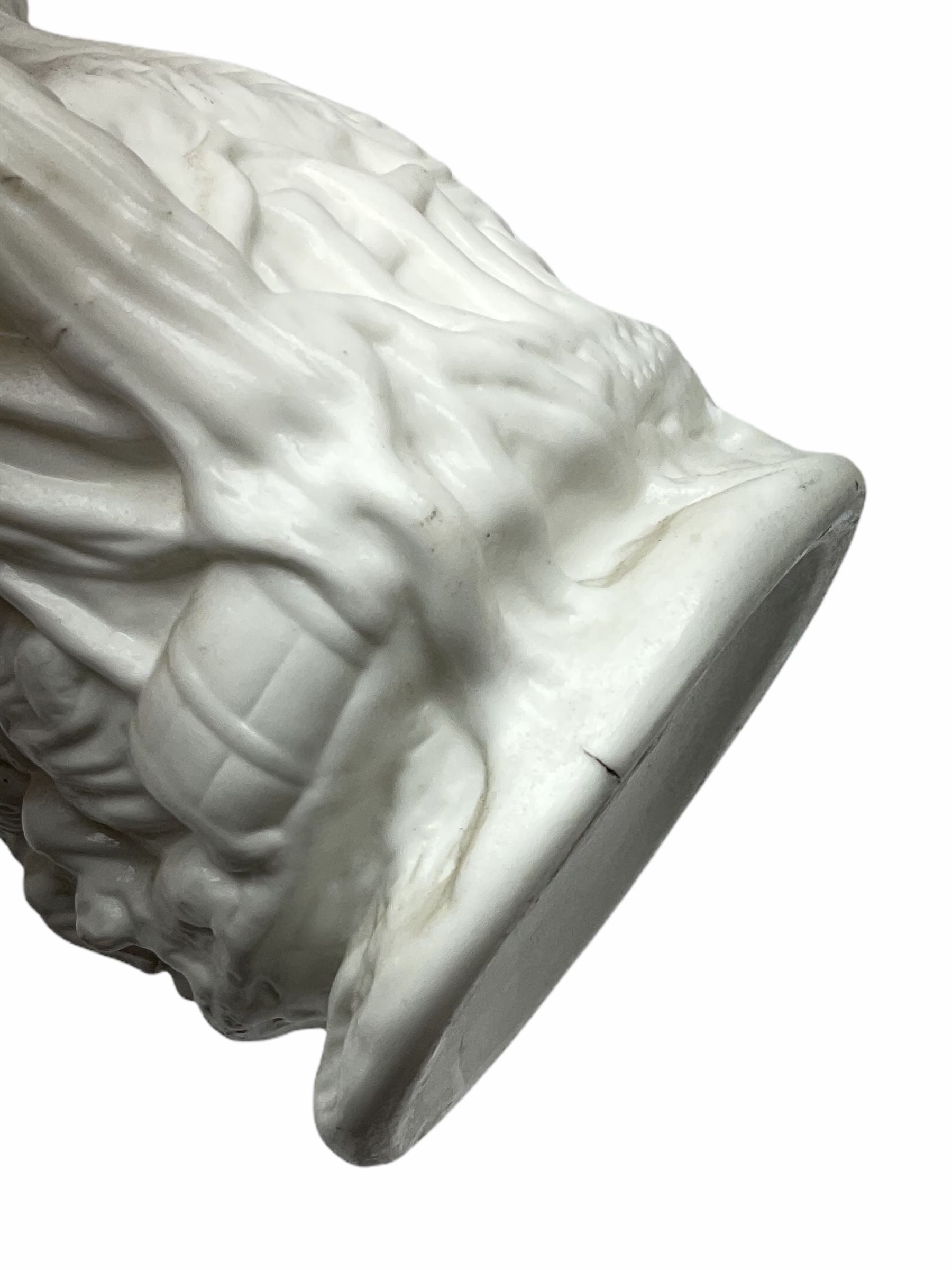 Victorian Parian ware twin handled vase detailed with Bacus masks fruiting vines and floral sprays H36cm, together with a Parian jug H14.5cm, classical Parian sculpture H40cm, decorative plaque decorated in high relief depicting two children D18.5cm. 