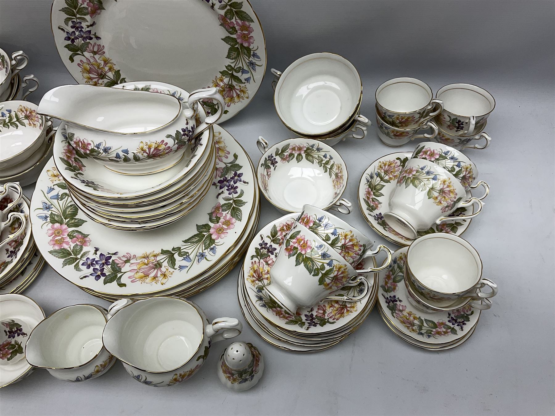 Paragon Country Lane part tea and dinner service, including eight tea cups and saucers, nine dinner plates, eight bowls, eight twin handled soup bowls, salt and pepper shakers etc (approx 80) 