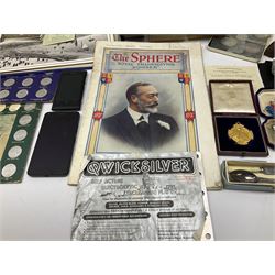 Four white metal 'Men in Space' medallions in original case; Victorian 1898 presentation trade medallion in case; Victorian 1897 Sheffield Visit medallion; two early mobile phones; postcards; and other items