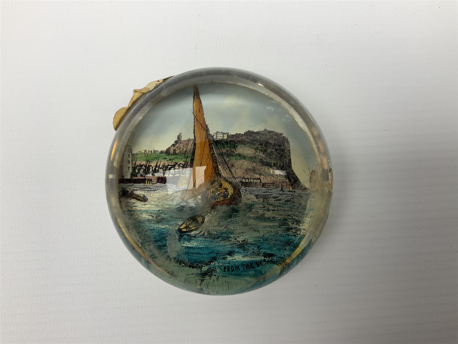 Cylindrical music box with domed lid depicting the Music Room at Buckingham Palace and playing Mozart's 'Voi Che Sapete', limited edition 187 of 250, boxed, together with enamel box for the silver jubilee and a victorian paperweight of Scarbrough  