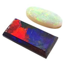 Loose rectangular black opal and a loose oval cabochon opal (2)

Notes: By direct decent from Barraclough family
