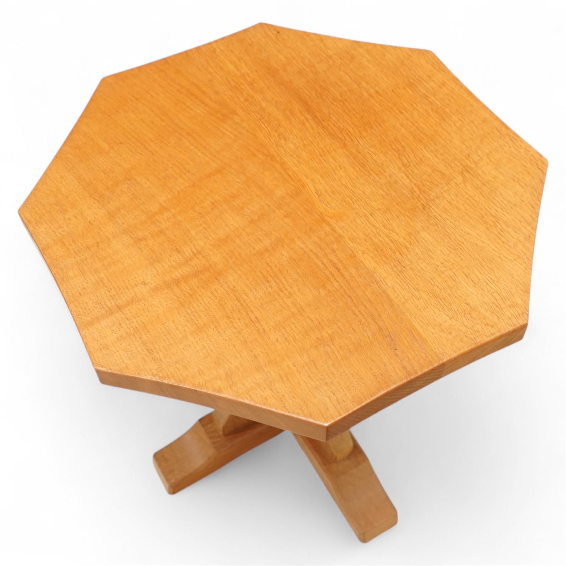 Mouseman - oak coffee table, octagonal adzed top on cruciform base and sledge feet, carved with mouse signature, by the workshop of Robert Thompson, Kilburn