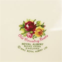 Royal Albert Country Roses tea and dinner service, teapot, milk jug, covered sucrier, eight dinner plates, eight teacups and saucers 