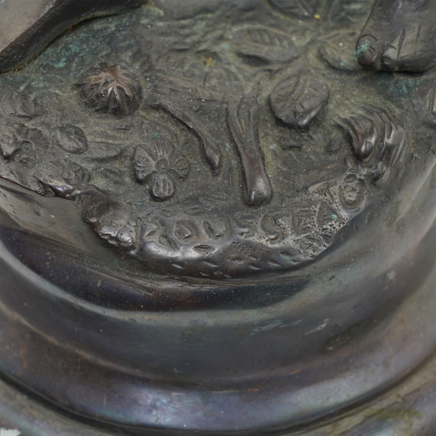 After Victor Rousseau (1865-1954)  - bronze sculpture of a lady holding aloft a torch and on circular base H50cm