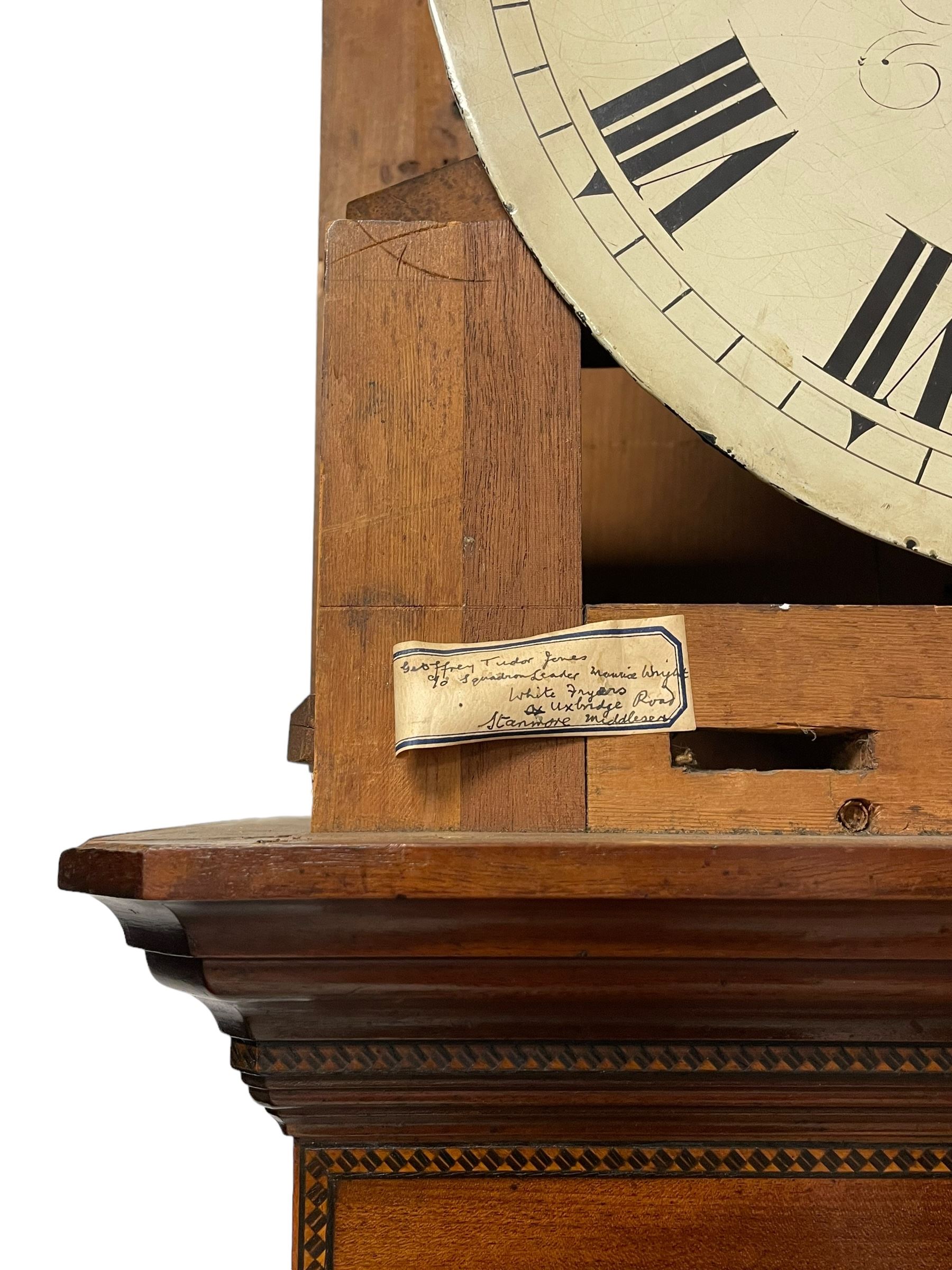 John Morgan of Aberystwyth - fine George IV mahogany 8-day longcase clock c1820, with a raised swan necked pediment, ball and eagle finial and deep inlaid frieze beneath, square hood door with a glazed circular wooden bezel and canted corners, long trunk with reeded quarter columns and a wavy topped door, rectangular plinth on bracket feet, circular painted dial with Roman numerals, minute track, makers name, and brass stamped hands, rack striking four pillar movement with a recoil anchor escapement, striking the hours on a bell. With weights and pendulum. 
John Morgan is recorded as working in Aberystwyth 1816-35. 