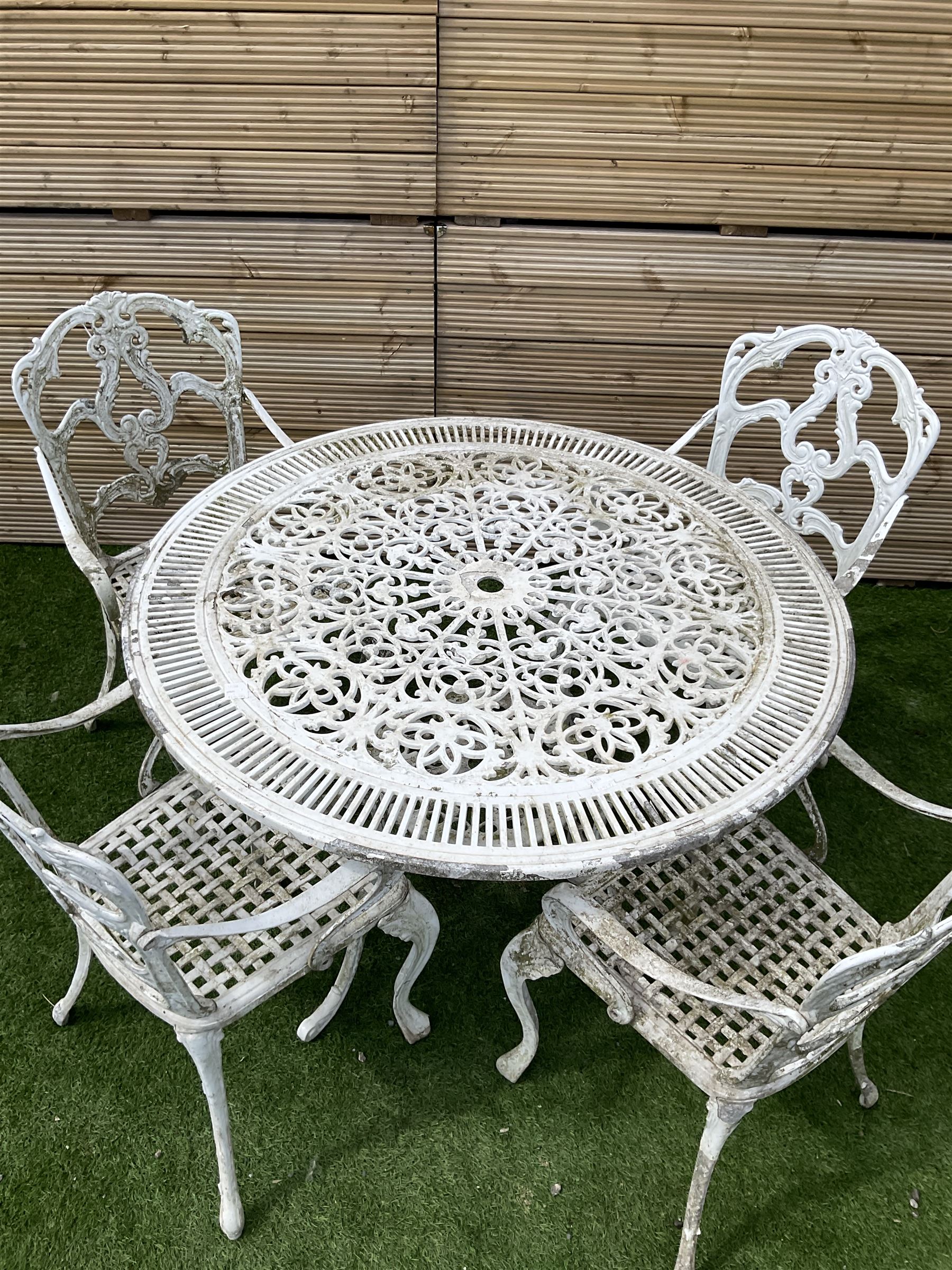 Victorian style cast aluminium white painted garden table and four chairs - THIS LOT IS TO BE COLLECTED BY APPOINTMENT FROM DUGGLEBY STORAGE, GREAT HILL, EASTFIELD, SCARBOROUGH, YO11 3TX