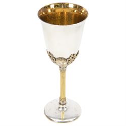 Late 20th century silver goblet, commemorating the birth of HRH Prince William of Wales 21st June 1982, the goblet of plain form, with parcel gilt daffodils and ribbons atop a parcel gilt column stem upon a circular foot, hallmarked St James House Company, London 1982, H19.5cm
