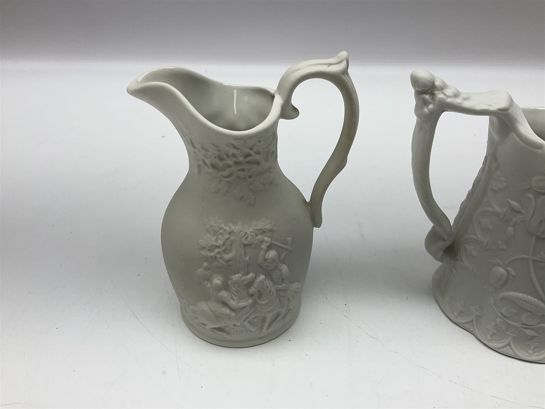  Six Portmeirion British Heritage Collection parian jugs, of various designs, H12cm