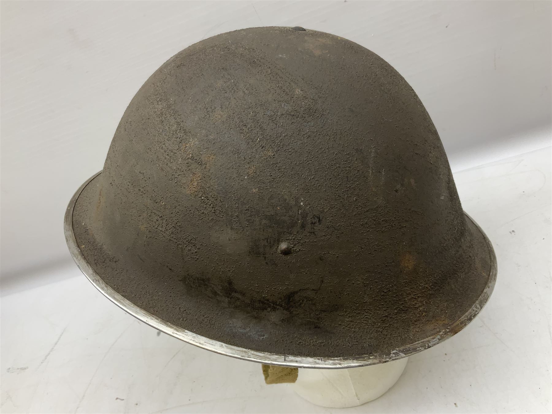 WW2 British Mk III steel combat helmet with textured finish and original liner