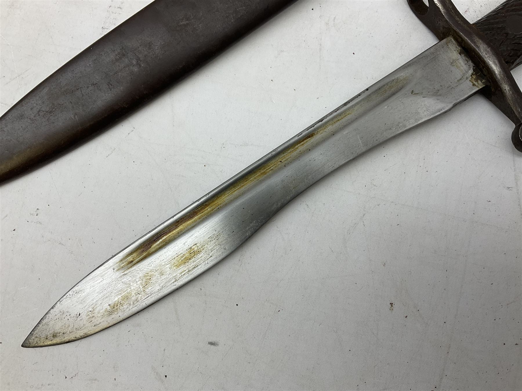 Austrian Model 1895 carbine NCO's knife bayonet with 25cm fullered steel blade; in steel scabbard with webbing frog L39cm overall; and Spanish Model 1941 Bolo bayonet with 25cm fullered steel blade No.6412D; in steel scabbard (2)