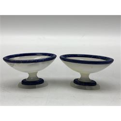 Pair of lapis lazuli and agate open salts, of navette form, upon a stepped oval pedestal foot, H5cm, L8cm
