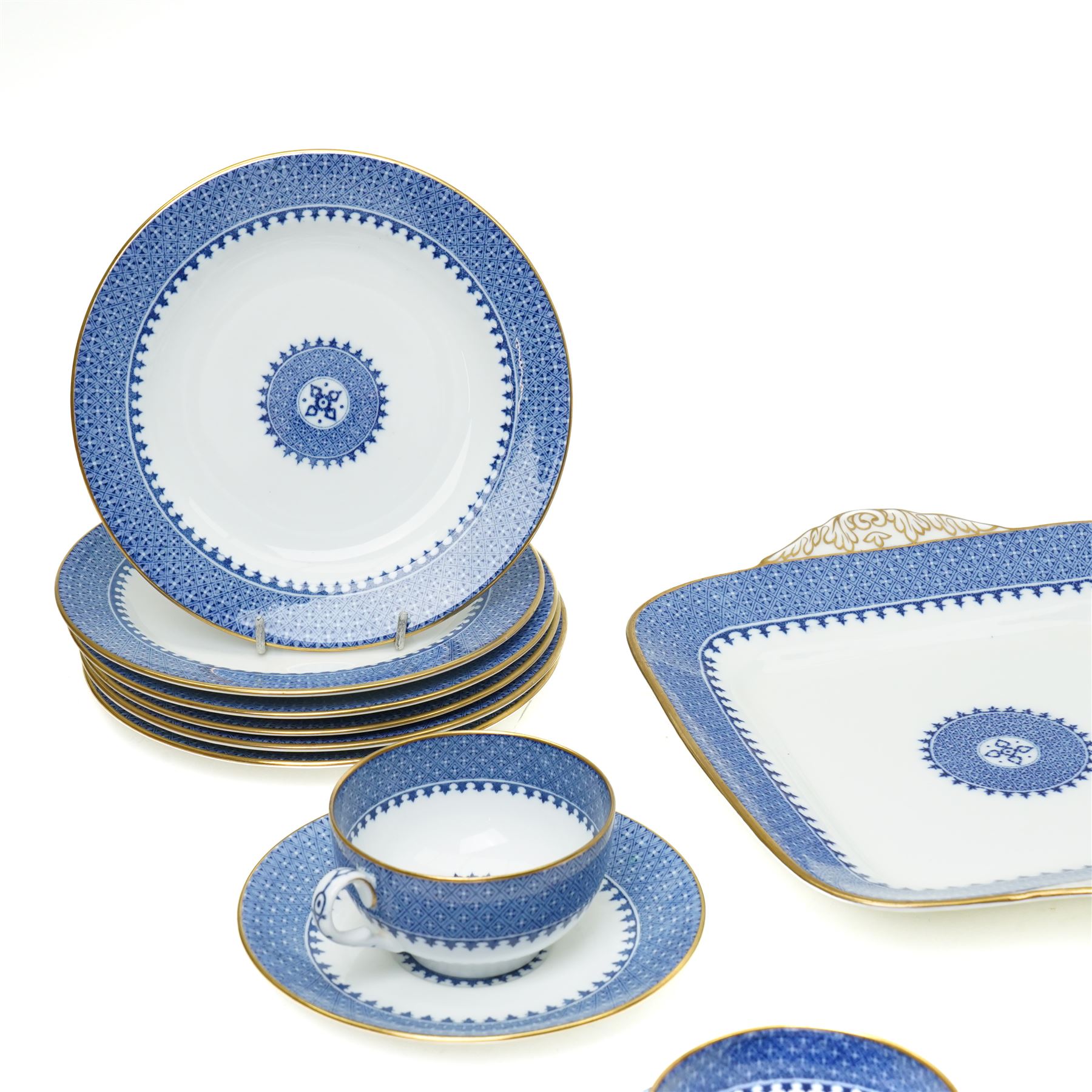 Wedgwood Lynn pattern blue and white tea service comprising eleven cups and saucers, twelve plates, milk jug, sugar bowl and two bread and butter plates