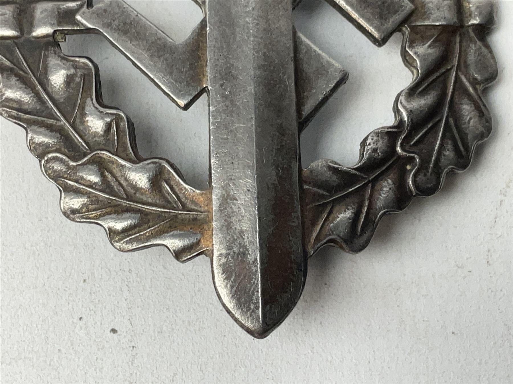 Two WW2 German Sports badges - SA sports badge marked verso 'W.Redo Eigentum D. Obersten SA. Fuhrung Saar Lautern'; and DRL sports badge marked verso 'Wernstein Jena D.R.G.M. 35269' (2)