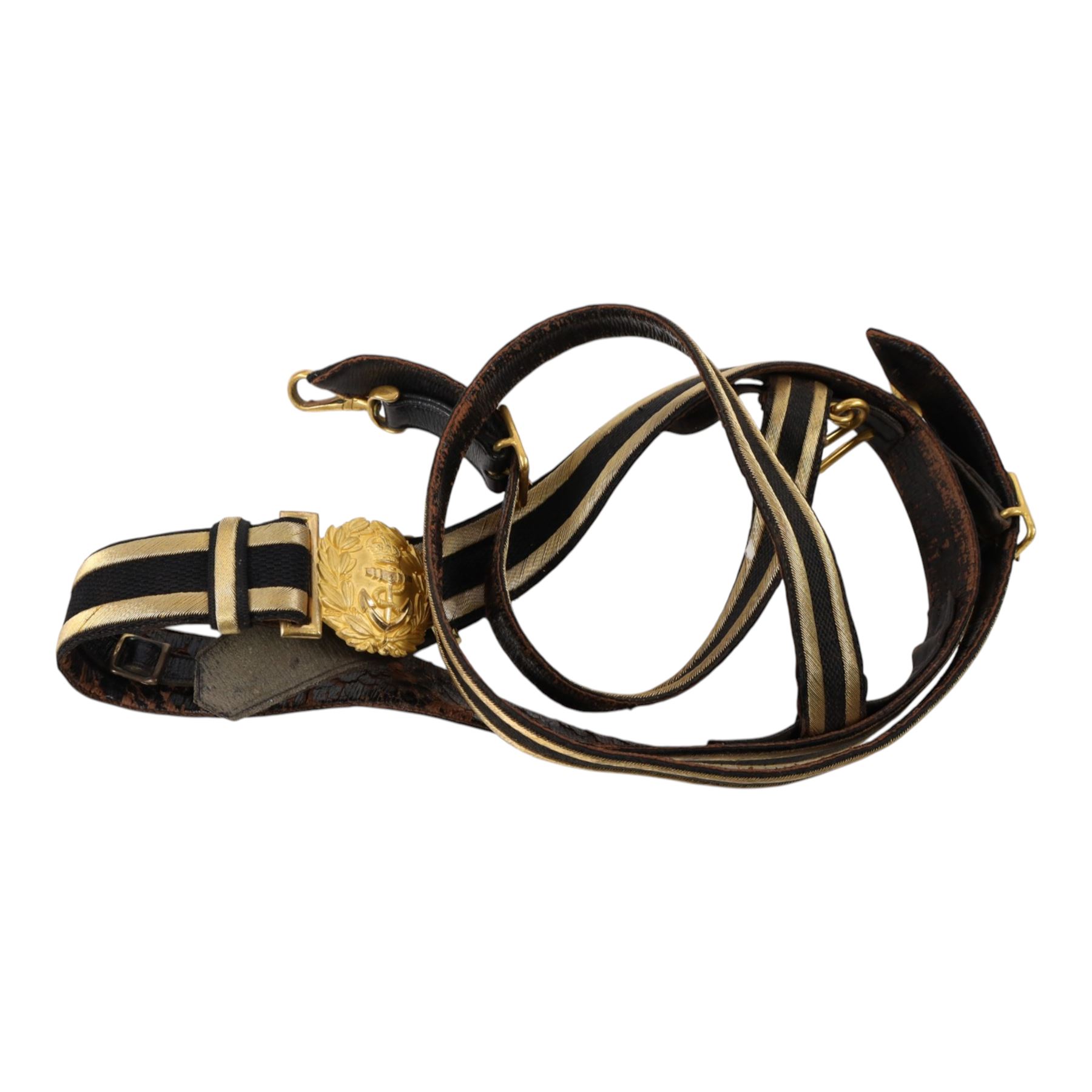 Early 20th century Royal Navy officers full dress bicorn hat, belt and epaulettes, the bicorn in black with gilt wire side and RN button, bullion work to each end marked to the interior with Gieves makers mark, all housed in fitted case